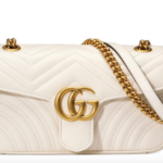 white & gpld handbag