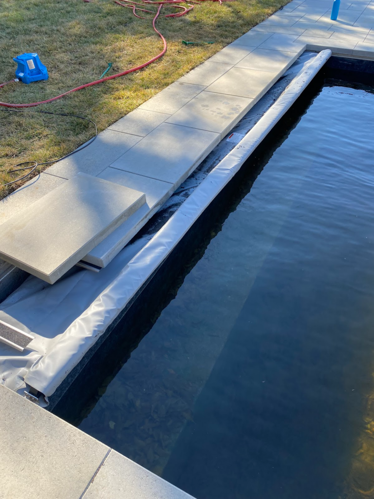 Photo of pool auto cover that blogger Amanda Seibert installed for safety
